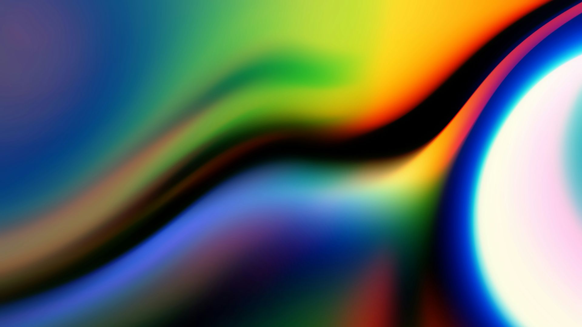 a multicolored background with a circular design