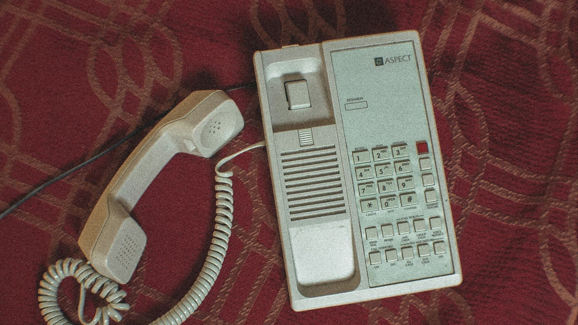 white corded home telephone