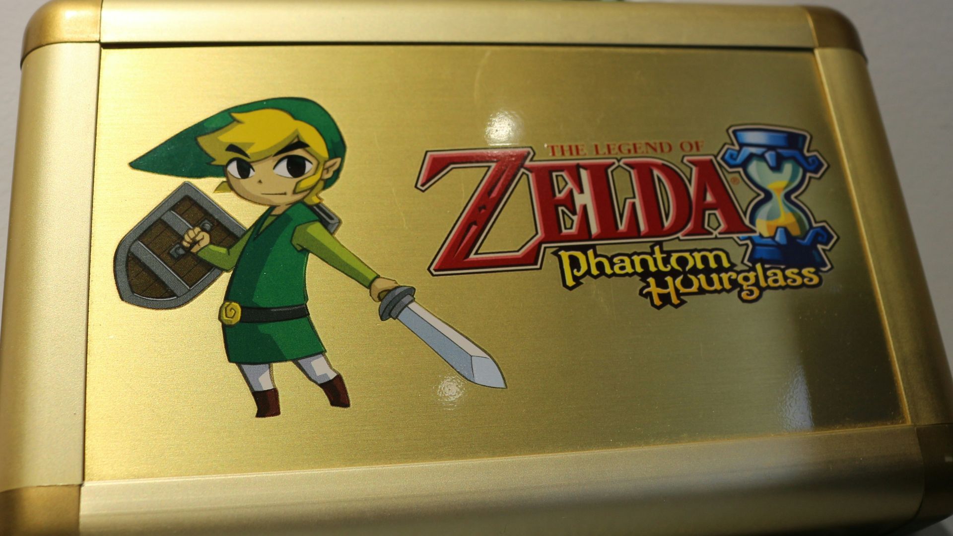 A nintendo wii game system sitting on top of a desk