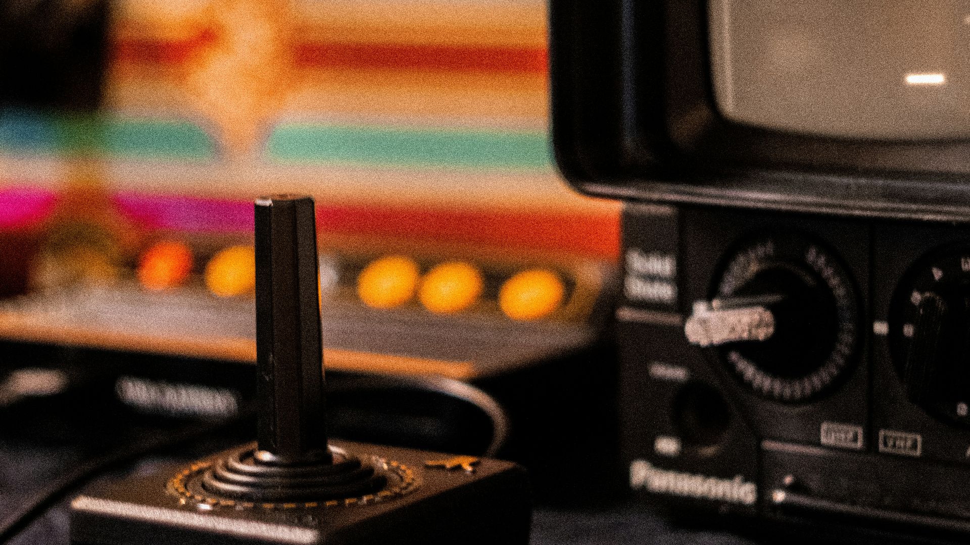 black and gray camera on black textile