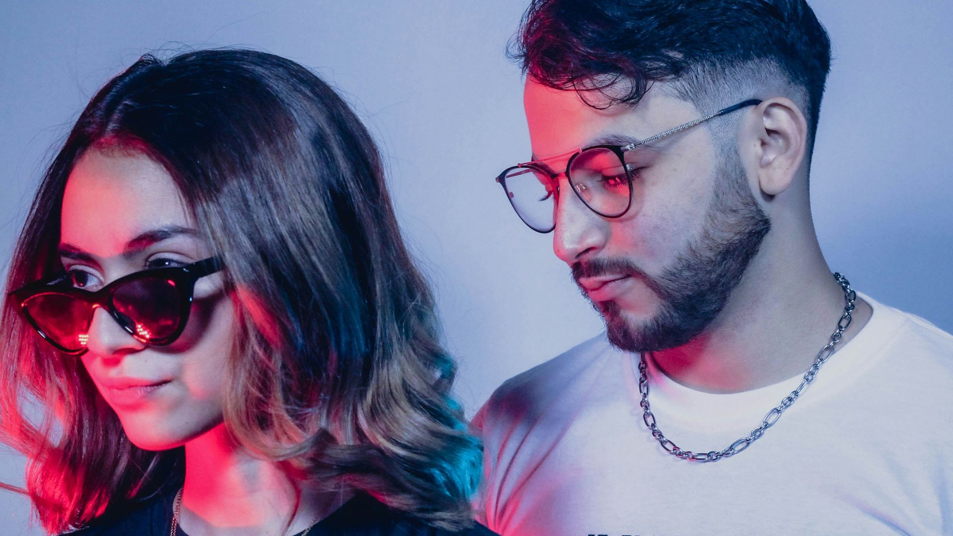 man in black crew neck t-shirt beside woman in white crew neck t-shirt