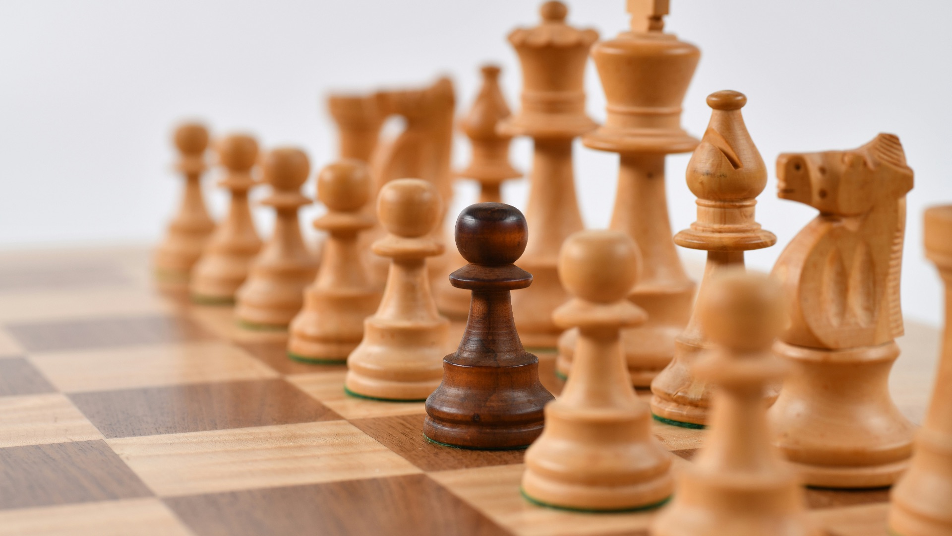 selective focus photography of chess pieces