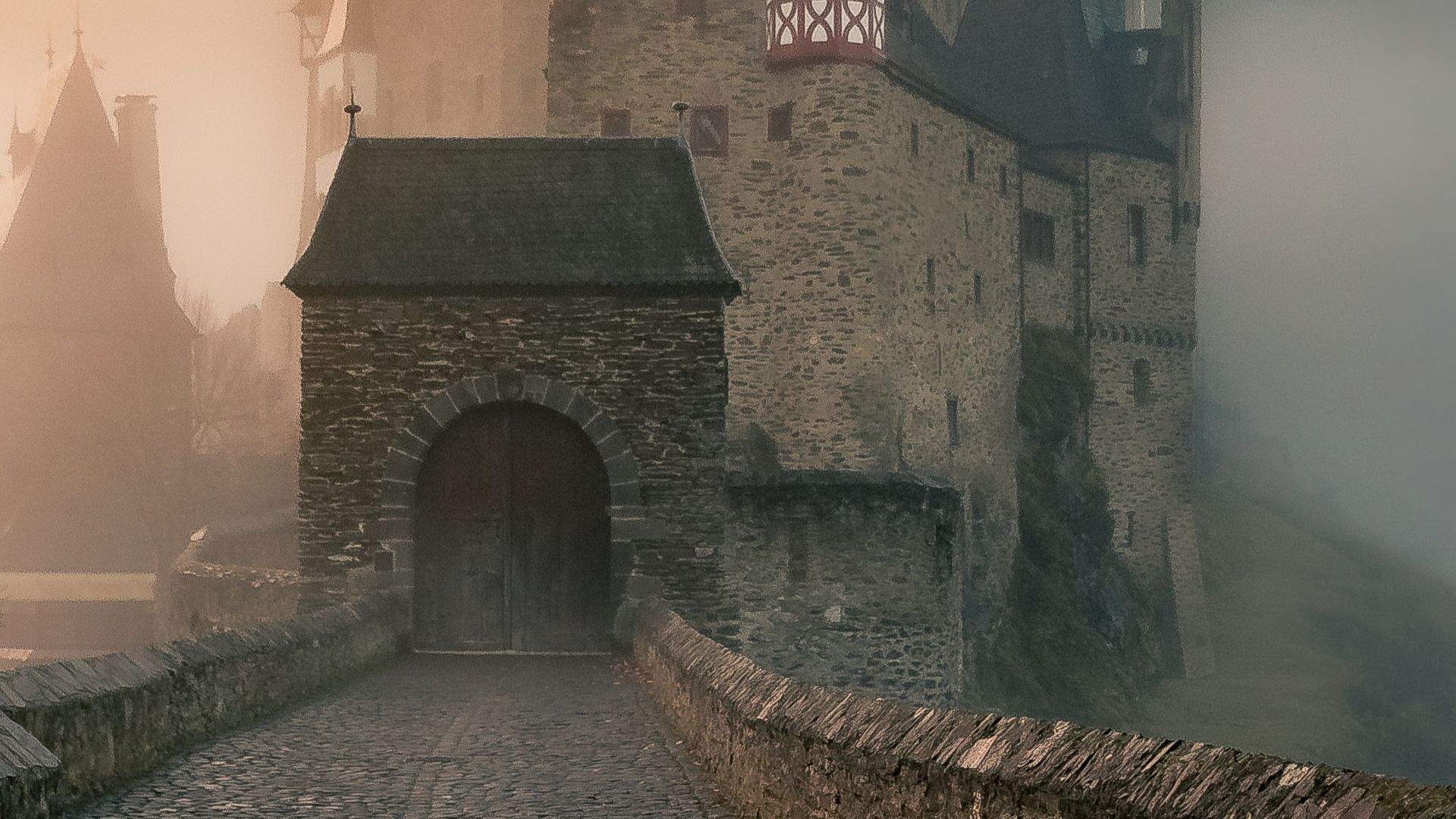 reflection of a castle surrounded with fogs