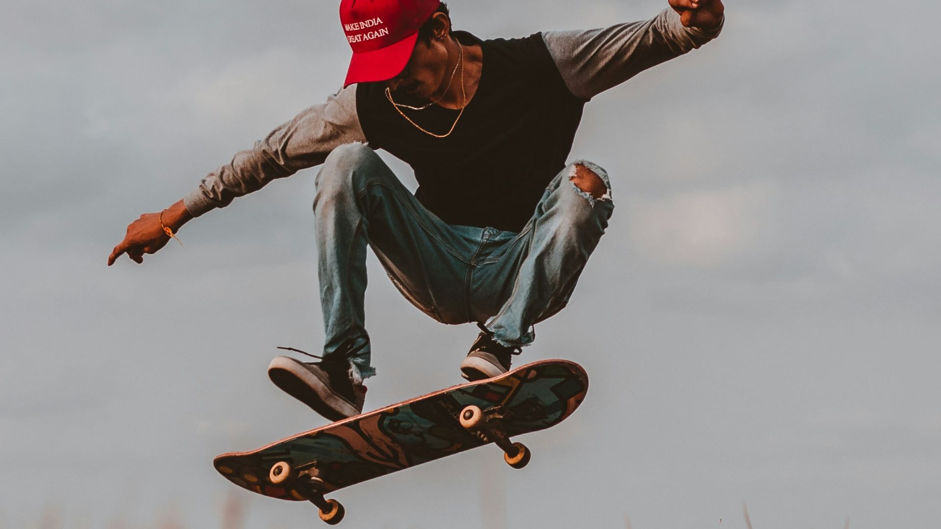 man performing skateboard trick during daytime