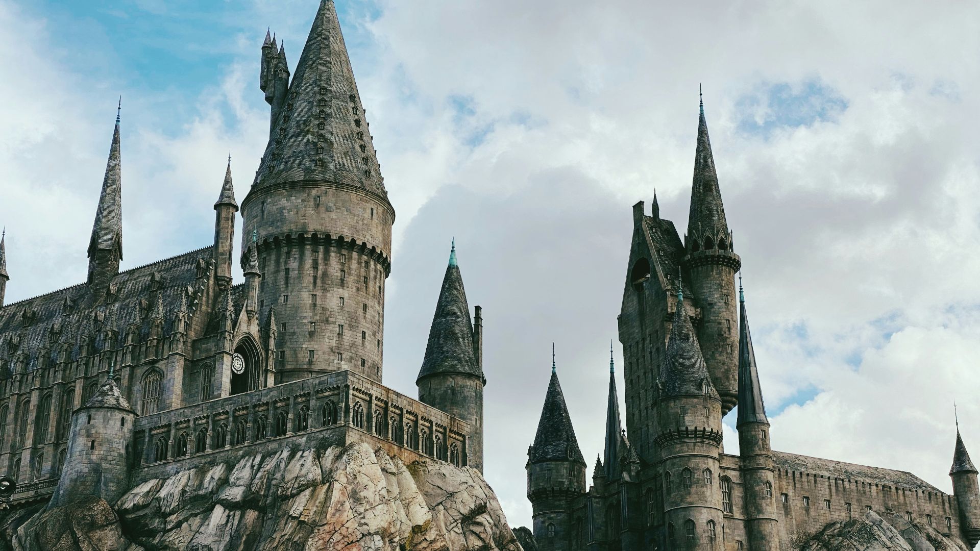 grey concrete castle under blue sky during daytime