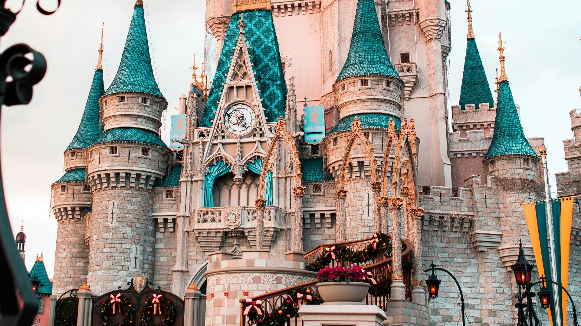 white and blue castle under cloudy sky during daytime
