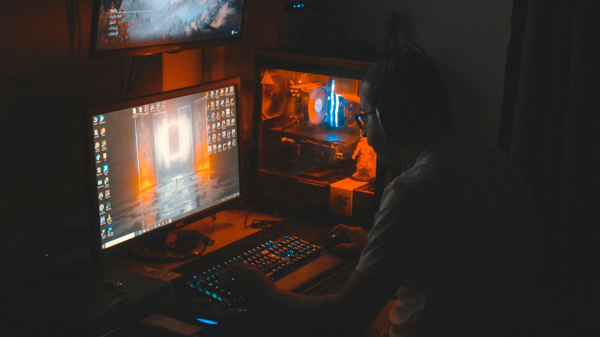 black flat screen computer monitor turned on near black computer keyboard