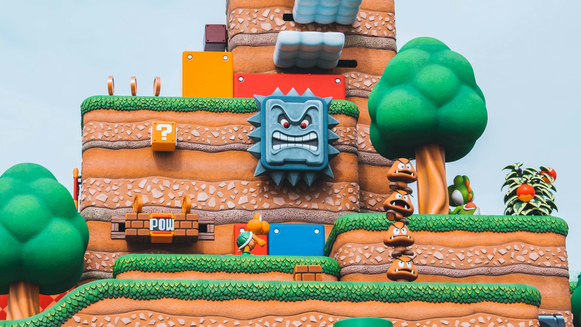 blue green and brown concrete building under blue sky during daytime