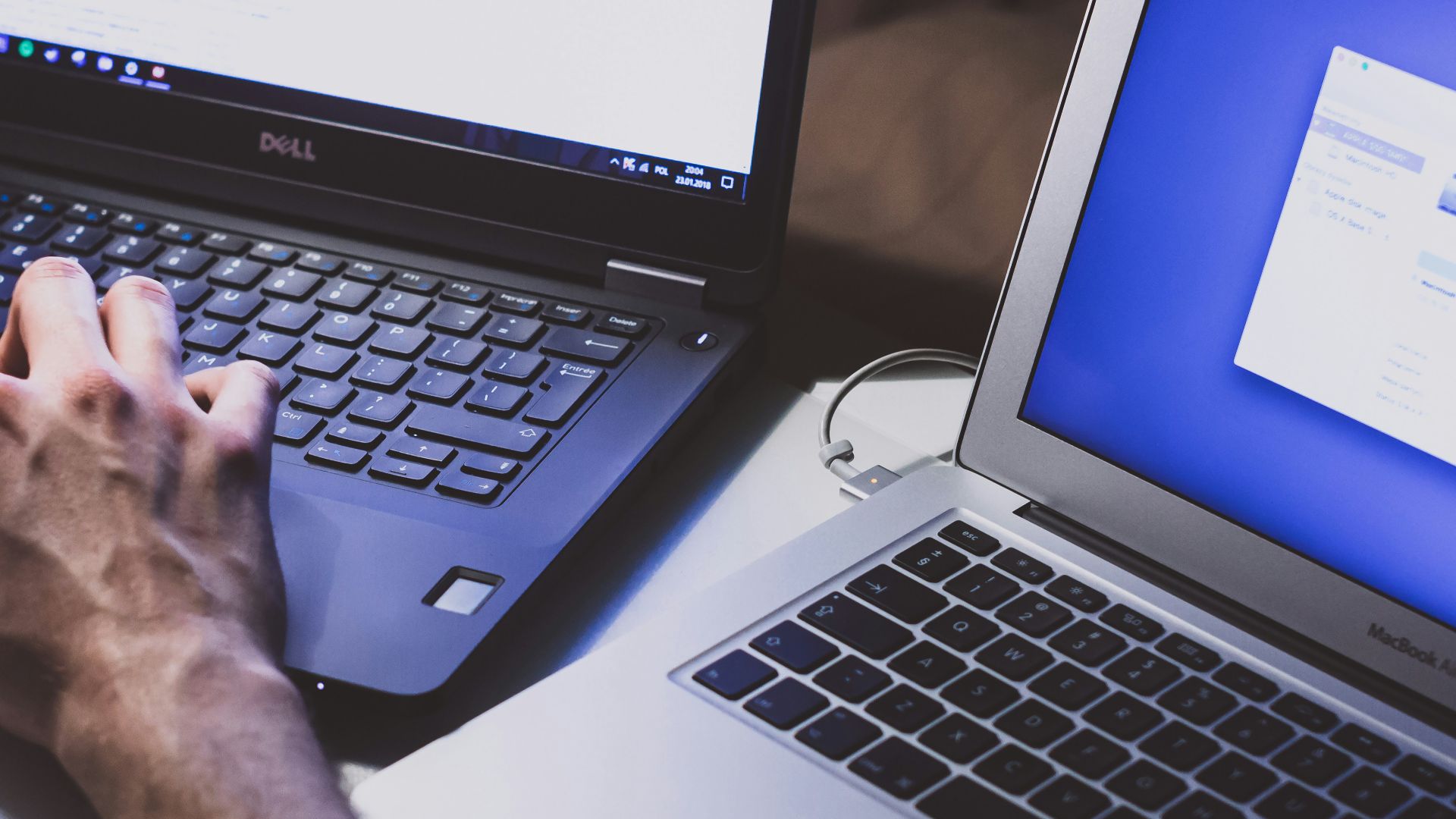 person using black laptop computer