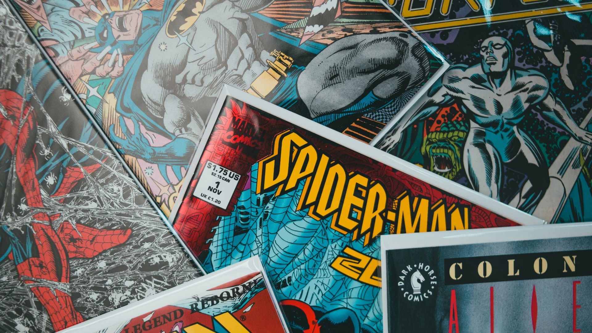 a pile of comics sitting next to each other