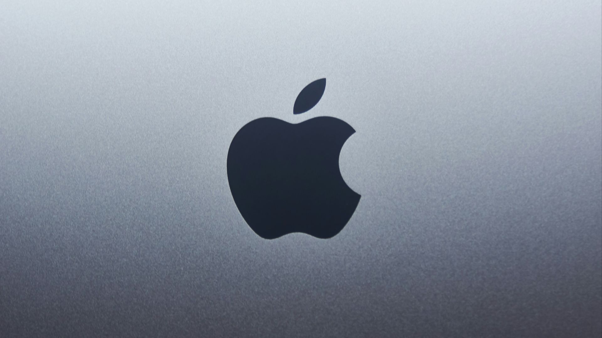 apple logo on blue surface