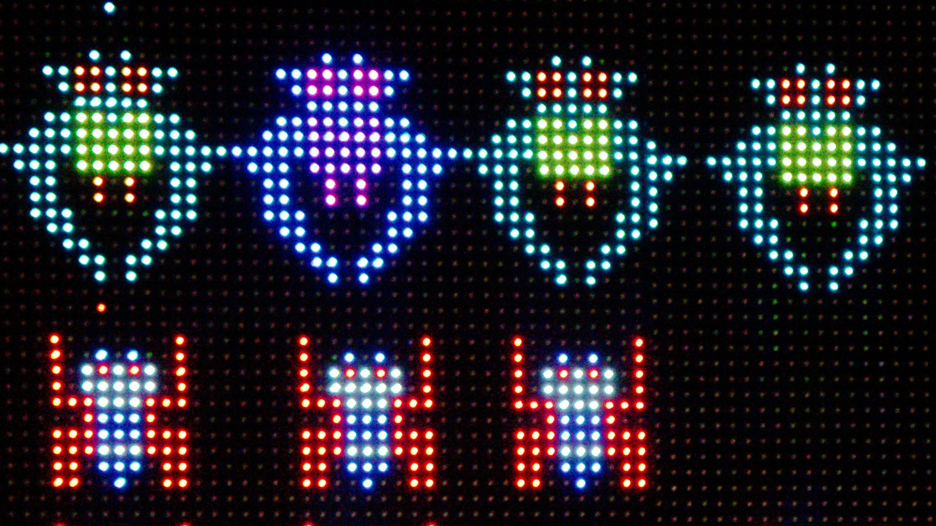 a close up of a lit up sign on a building