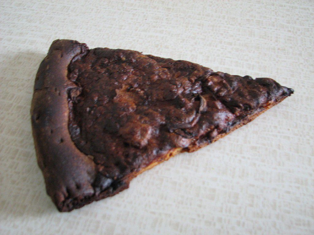 1280px-Overcooked_Pizza.jpg.optimal.jpg