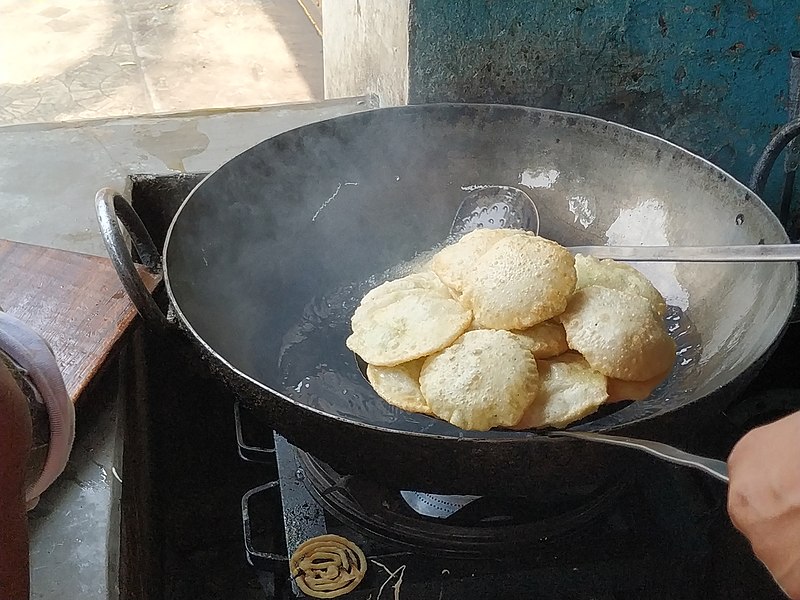 Deep Frying Puri In Kolkata, India