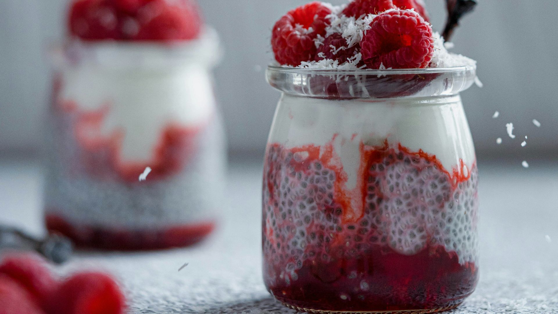 red and white ice cream on clear glass container