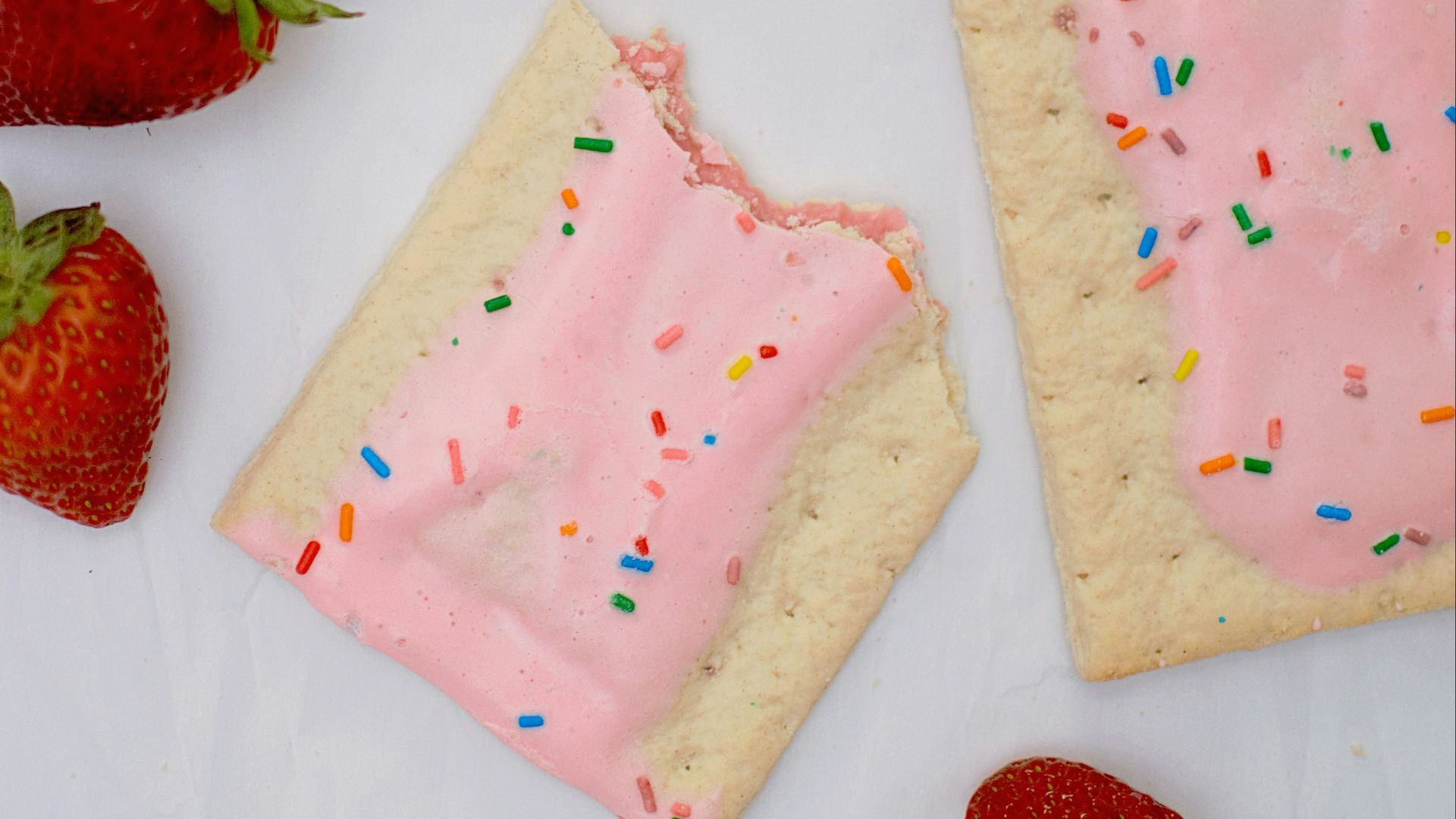 strawberries on white surface