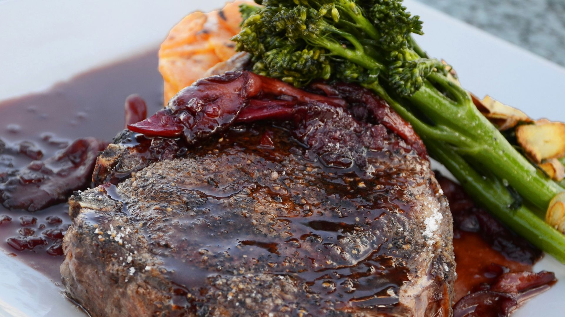 close-up photo of cooked food on square white plate