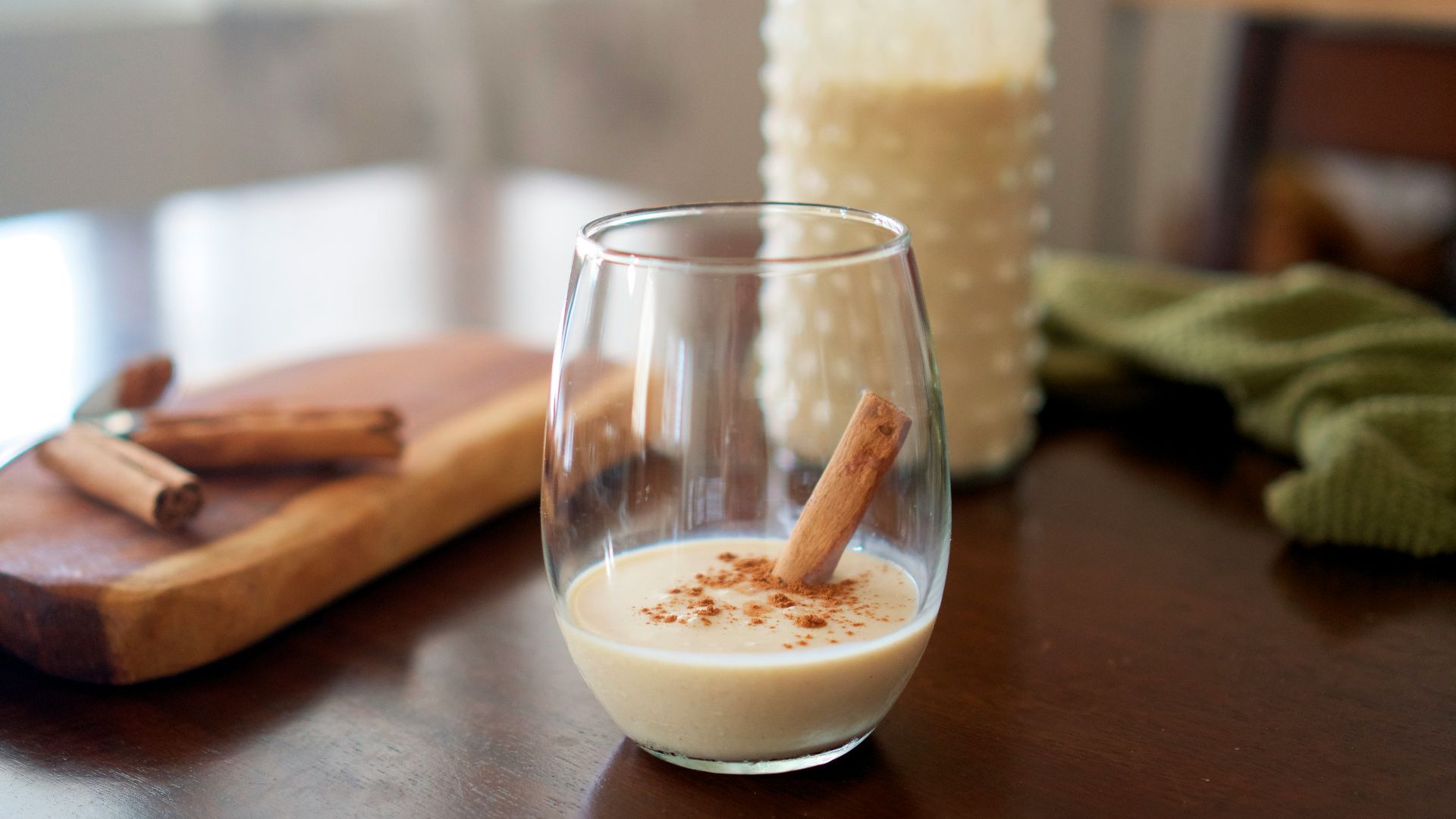 clear drinking glass with white liquid inside