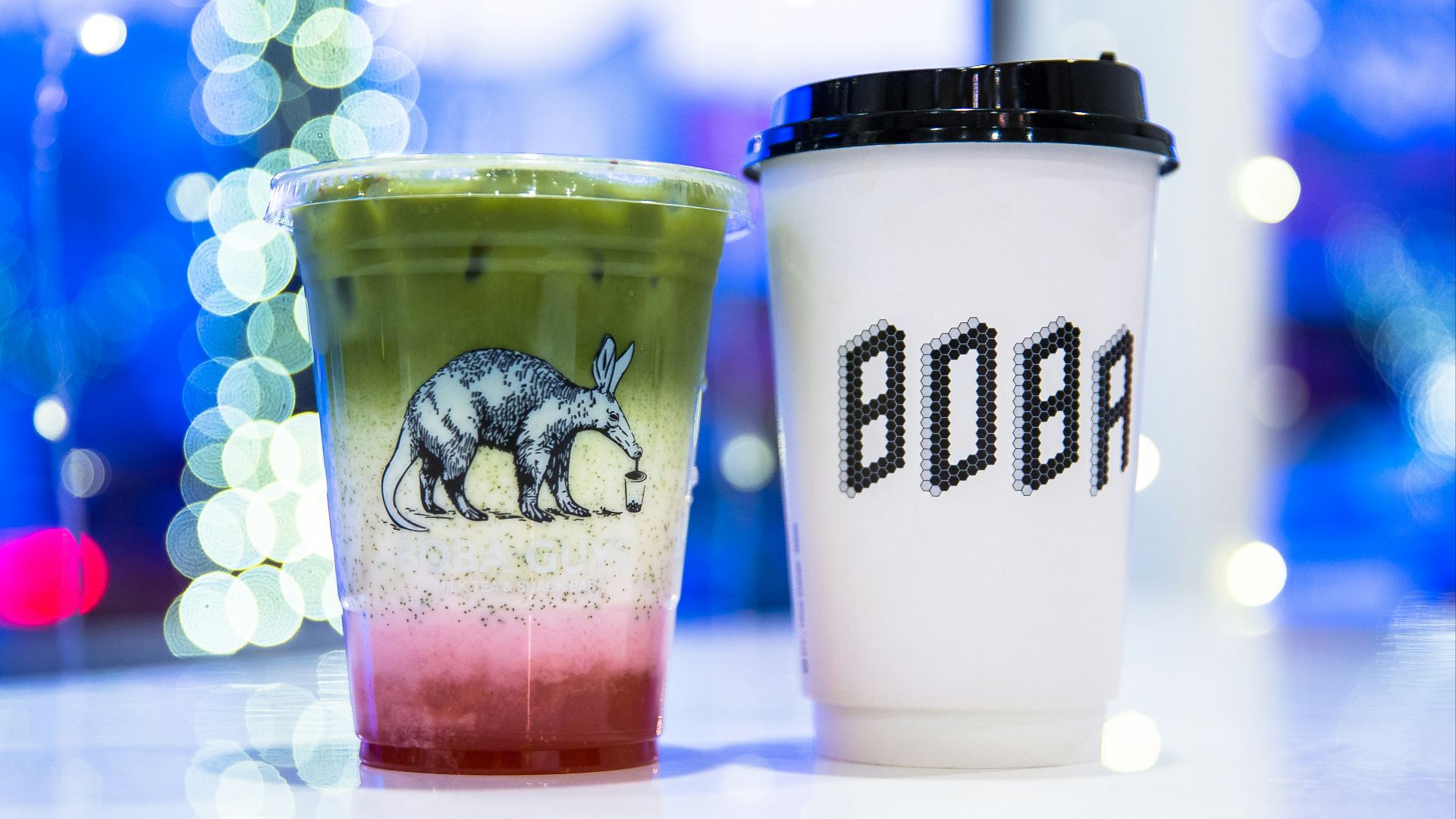 green and white tumblers