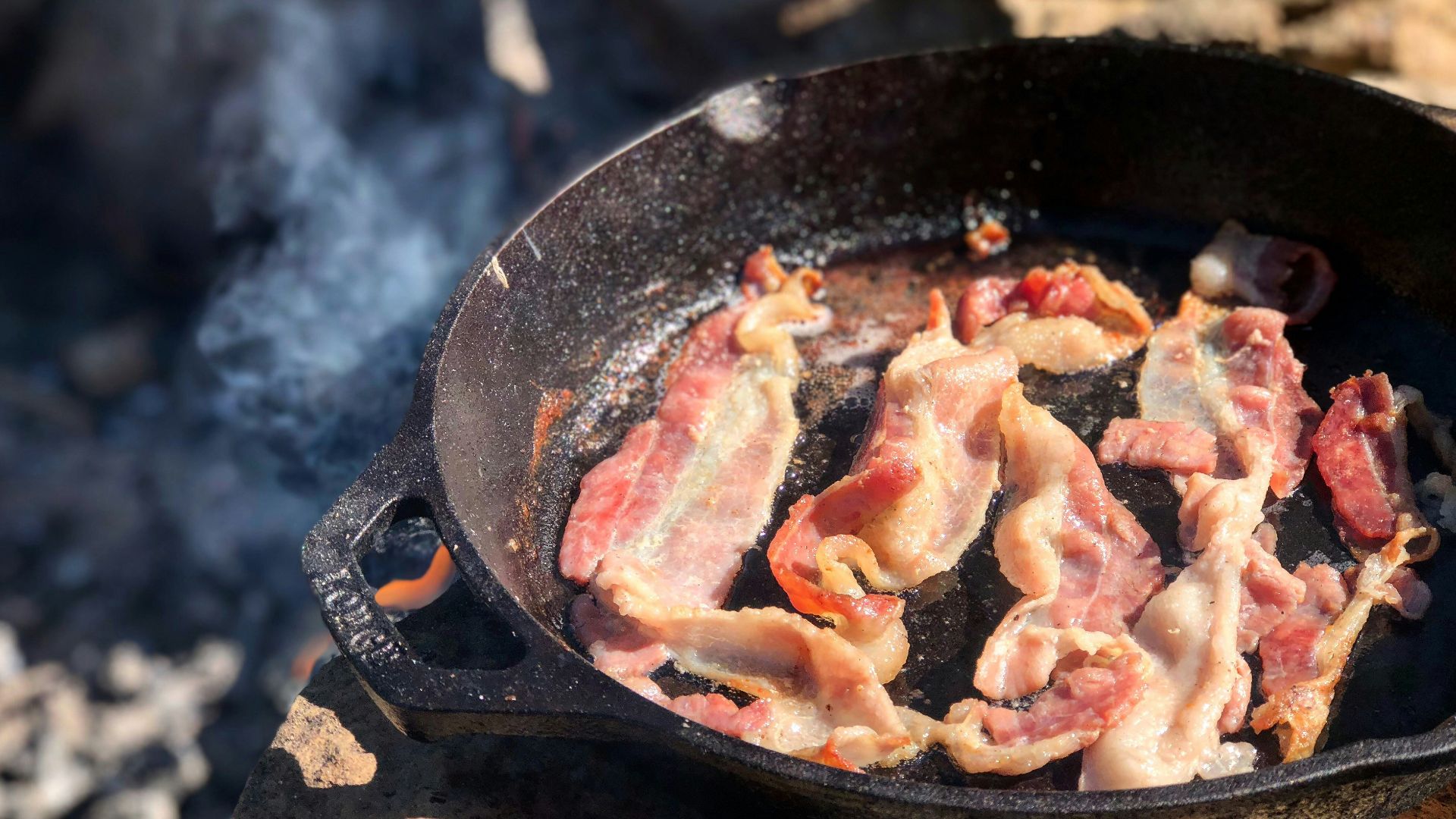 fried bacon in frying pan