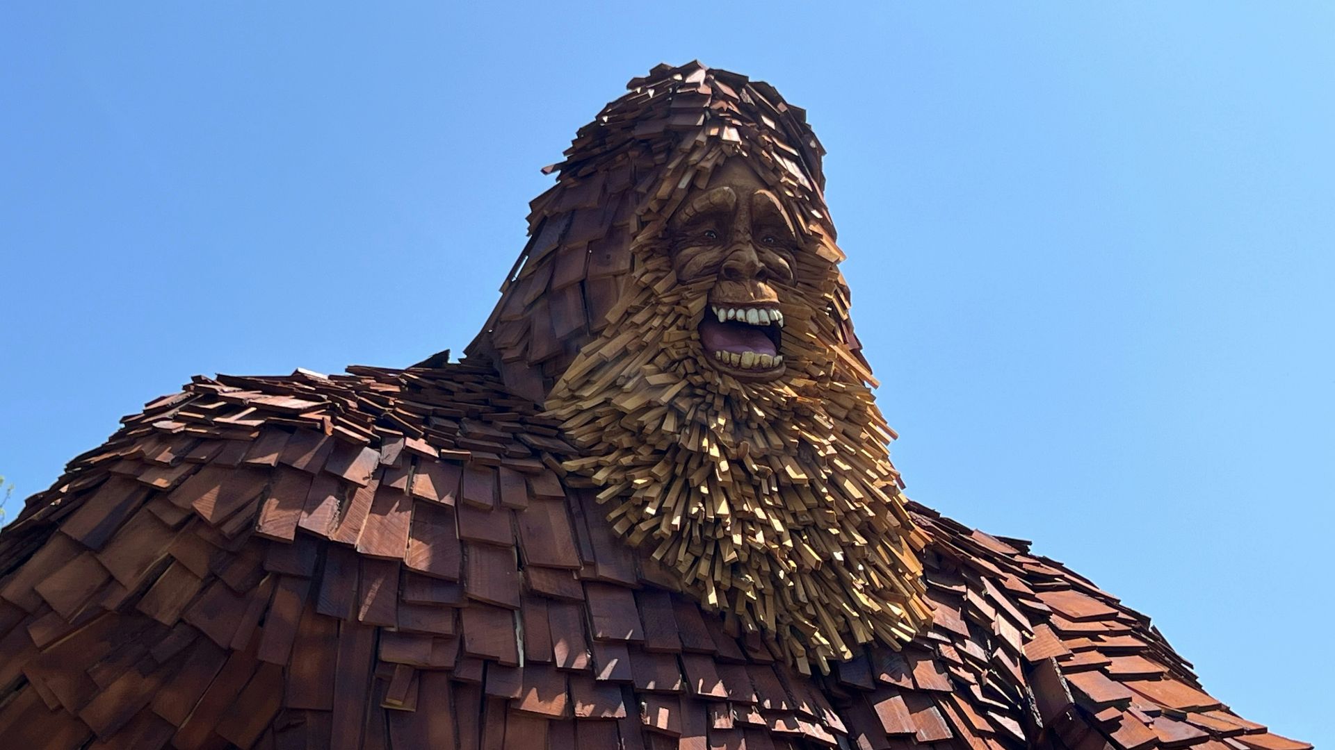 a large statue of a man with a beard