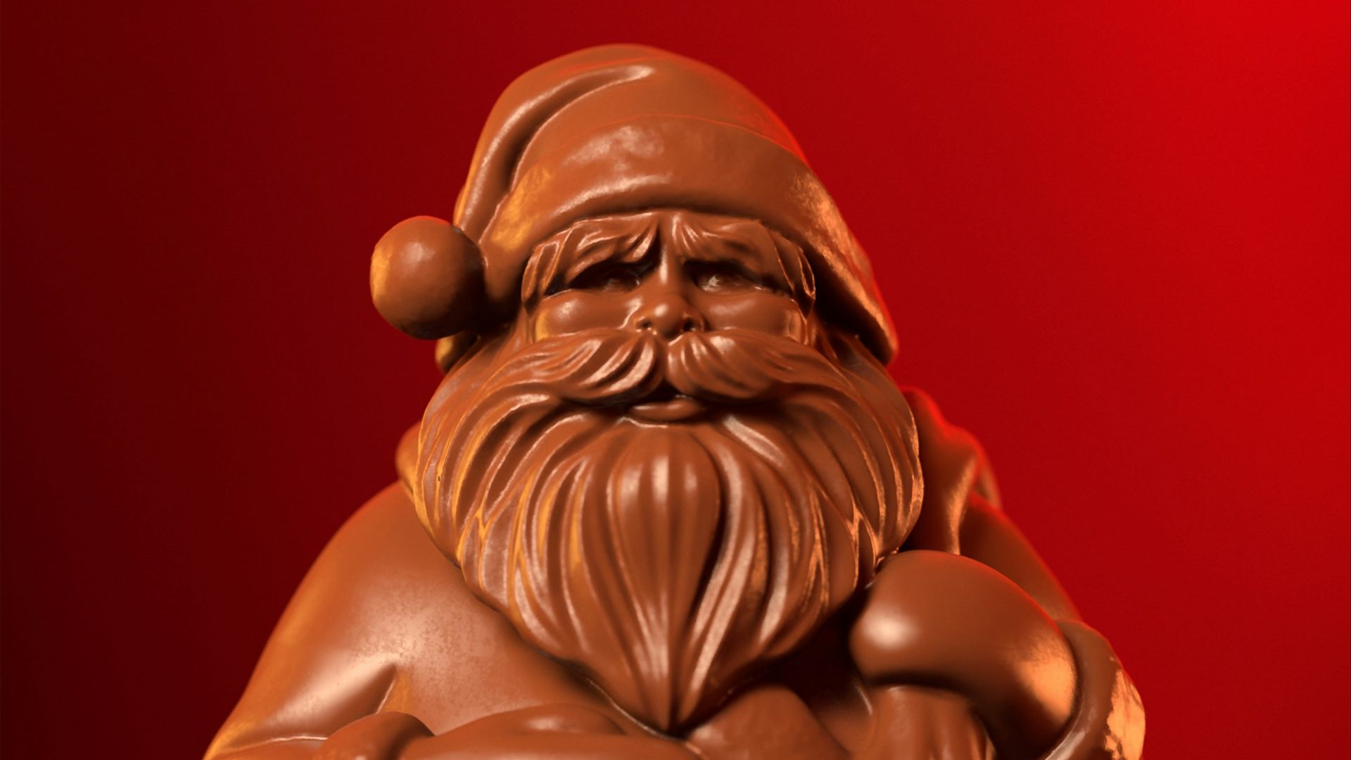 a close up of a chocolate santa clause