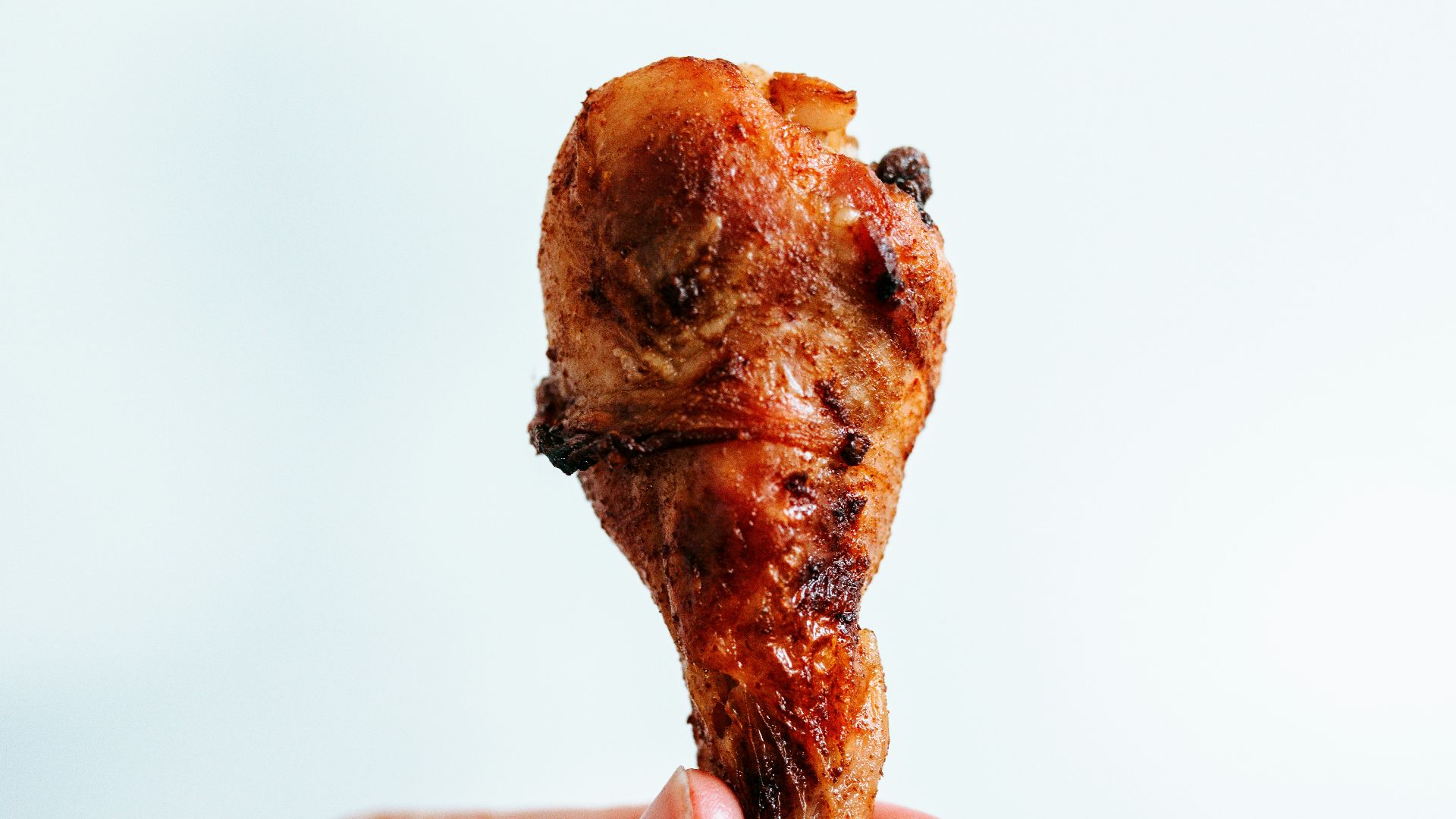person holding brown bread with chocolate