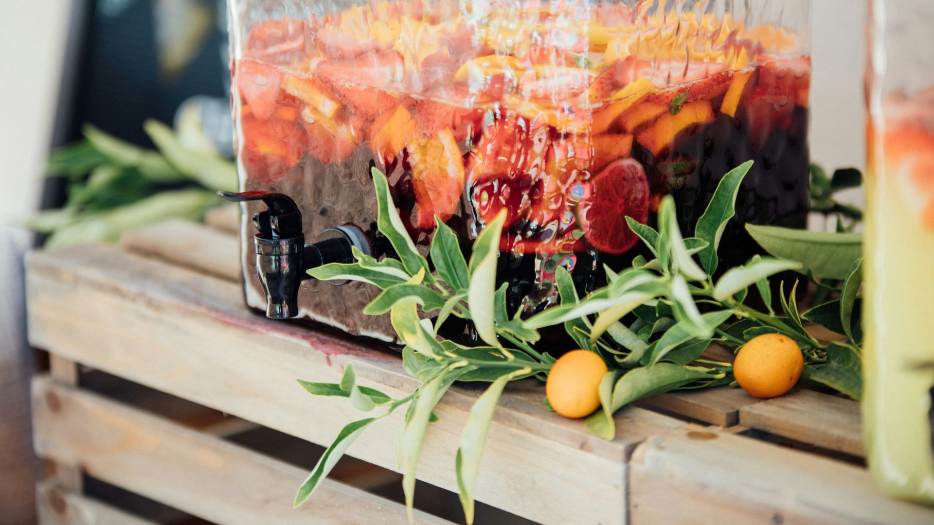 tangerine fruits on brown wooden crate