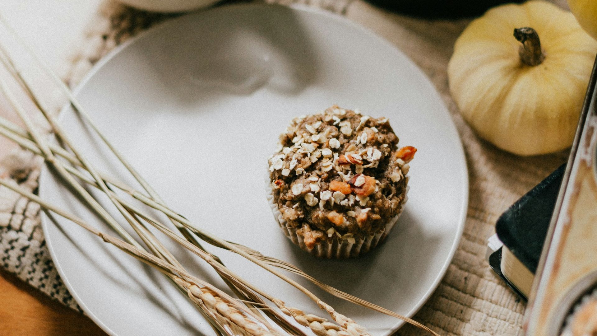 white ceramic bowl on brown woven basket