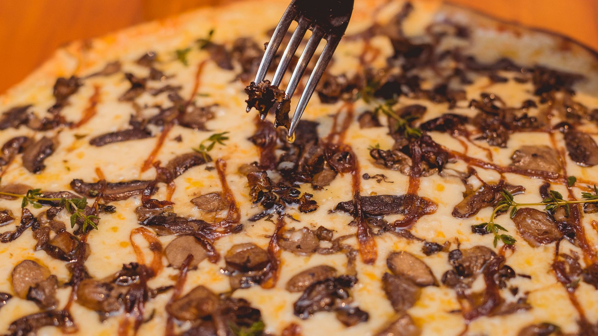 gray stainless steel fork and food