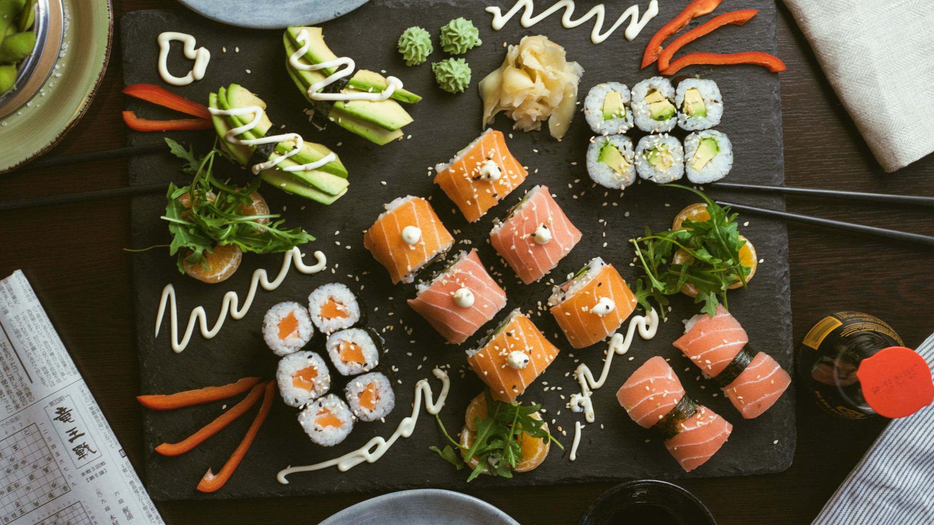 sushi on black ceramic plate