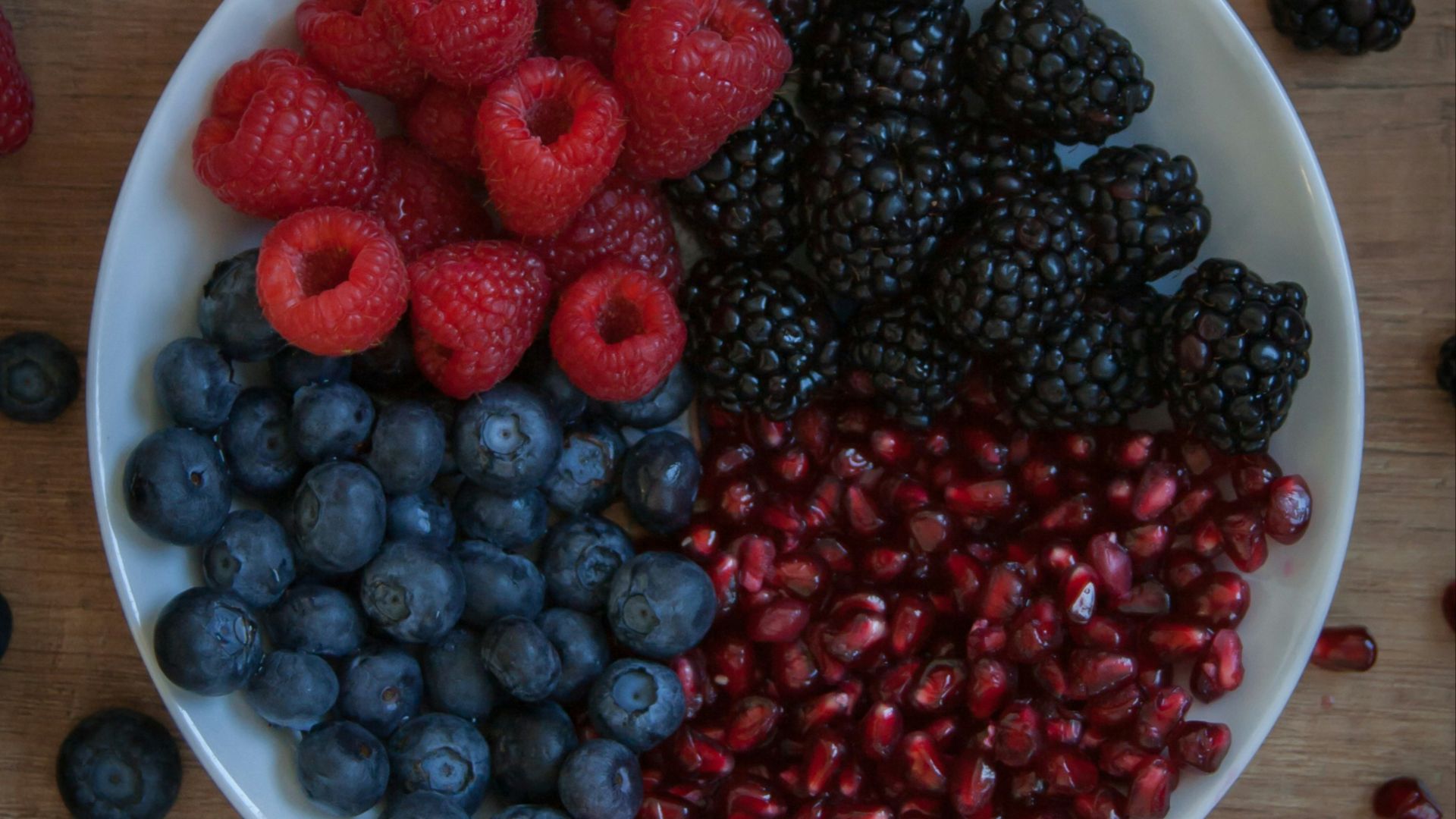 strawberries on white ceramic bowl