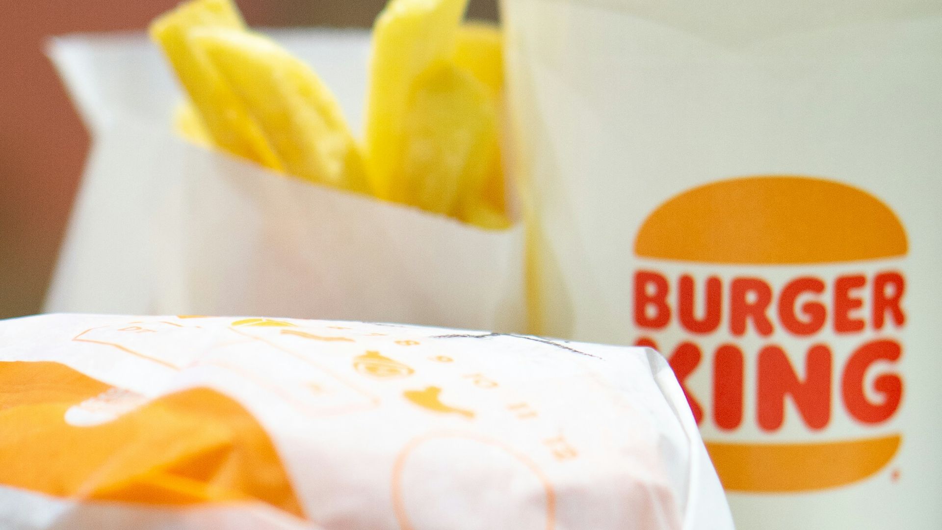 a plate with a sandwich and a cup of coffee