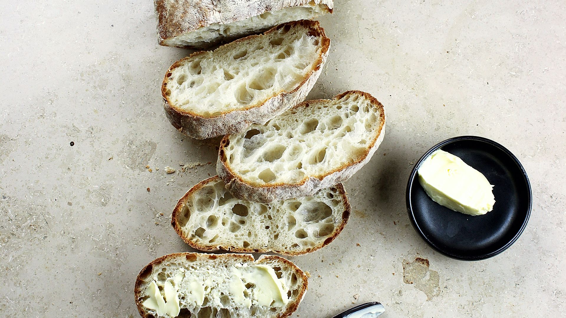 bread slices beside knife