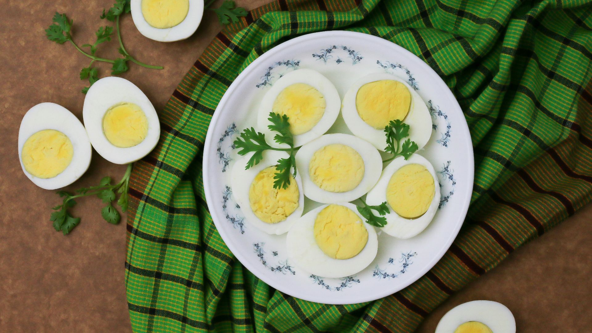 white and green floral round plate