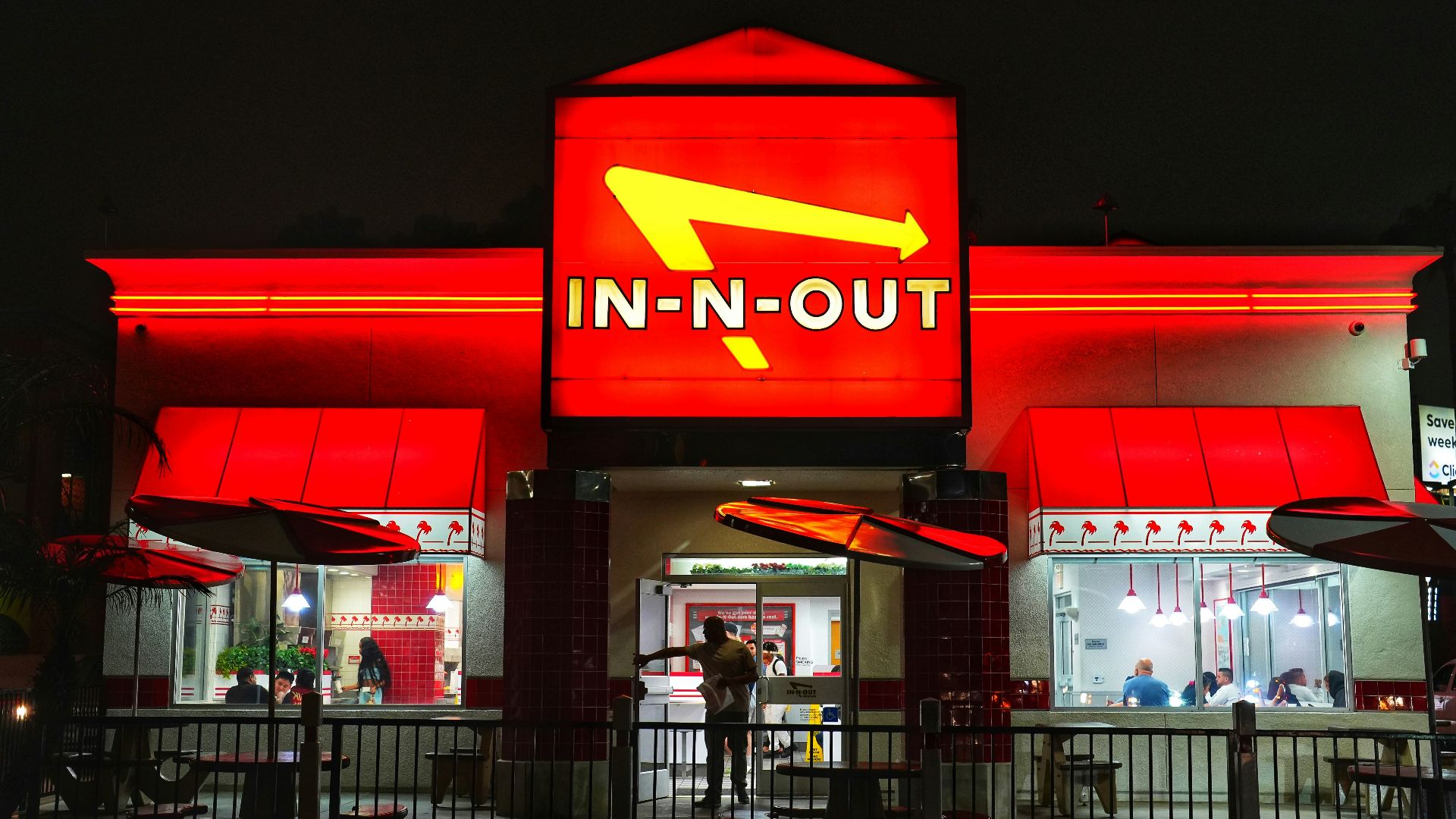 a restaurant with a sign