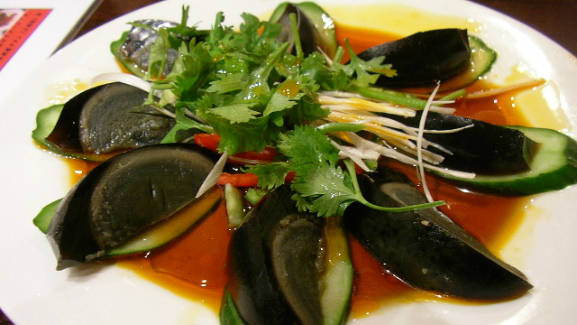 File:Century egg with cucumber by jetalone in Ginza.jpg
