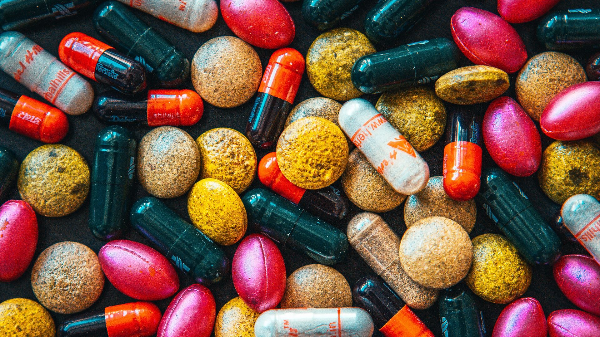 red and brown medication pill