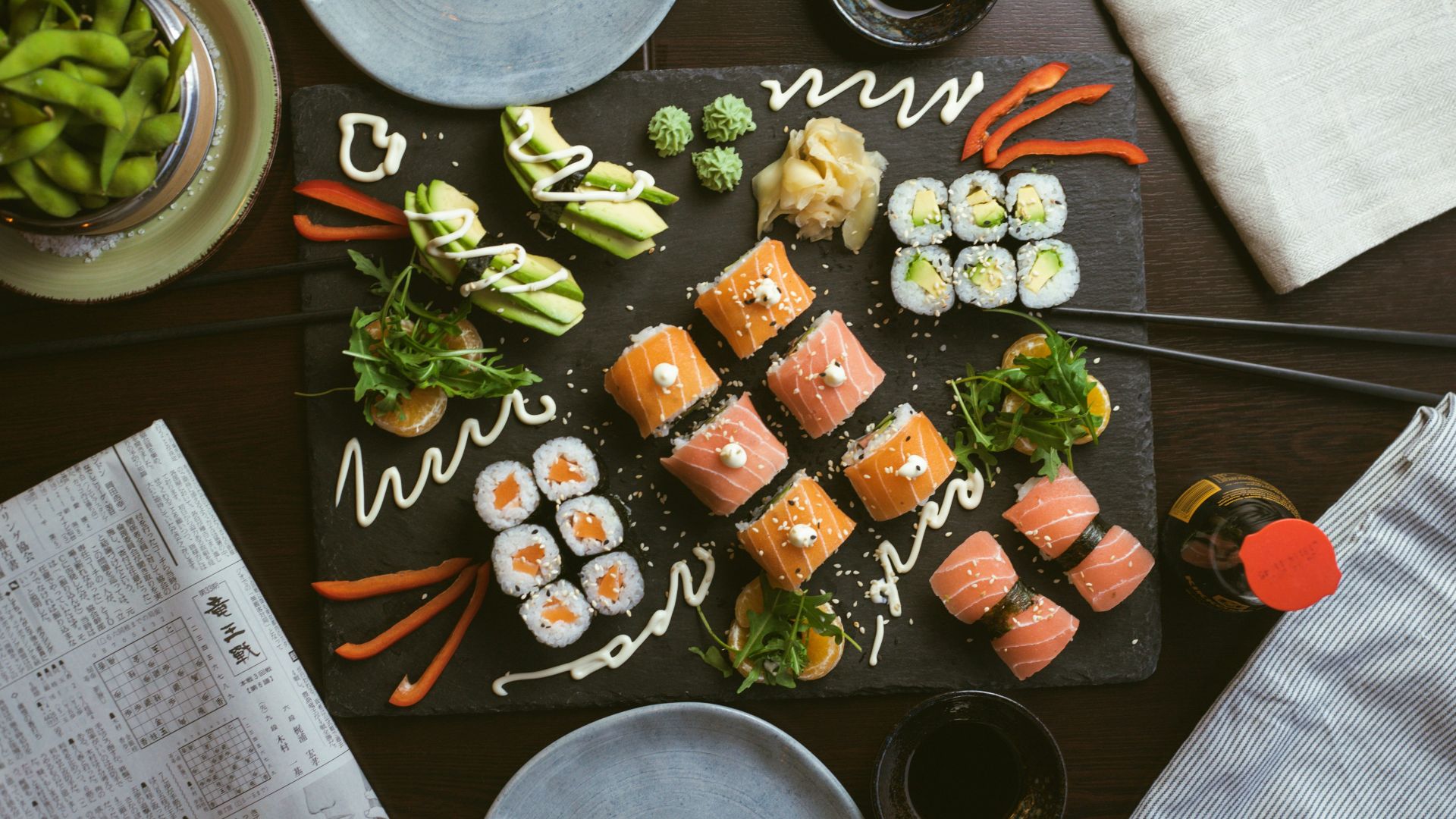 sushi on black ceramic plate
