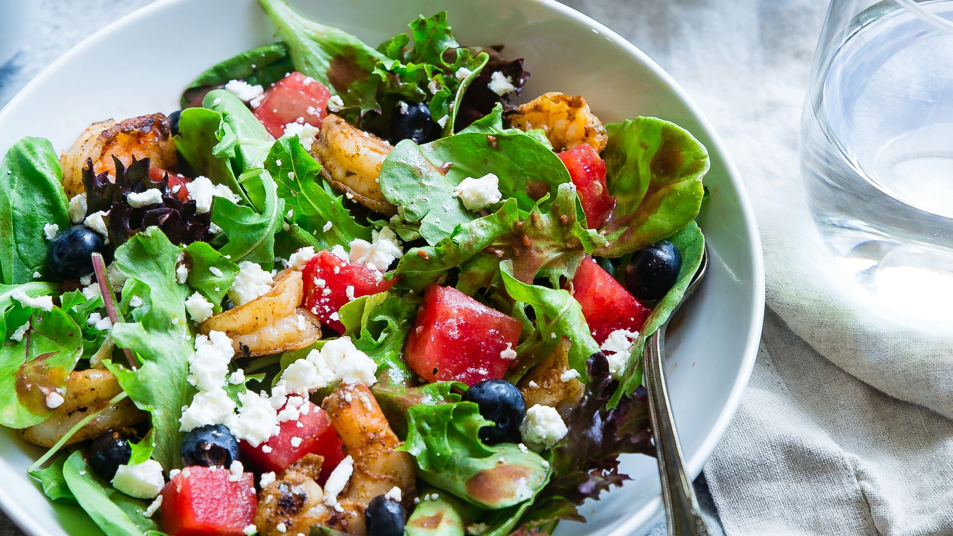 vegetable salad on white ceramic bowl
