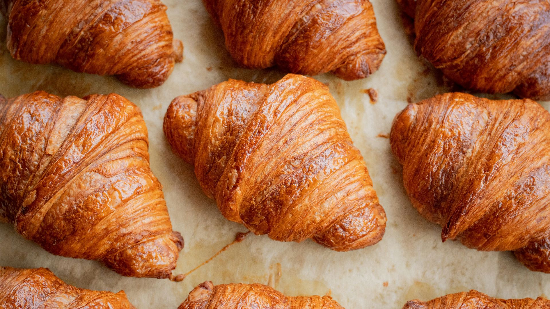 a bunch of croissants that are on a table