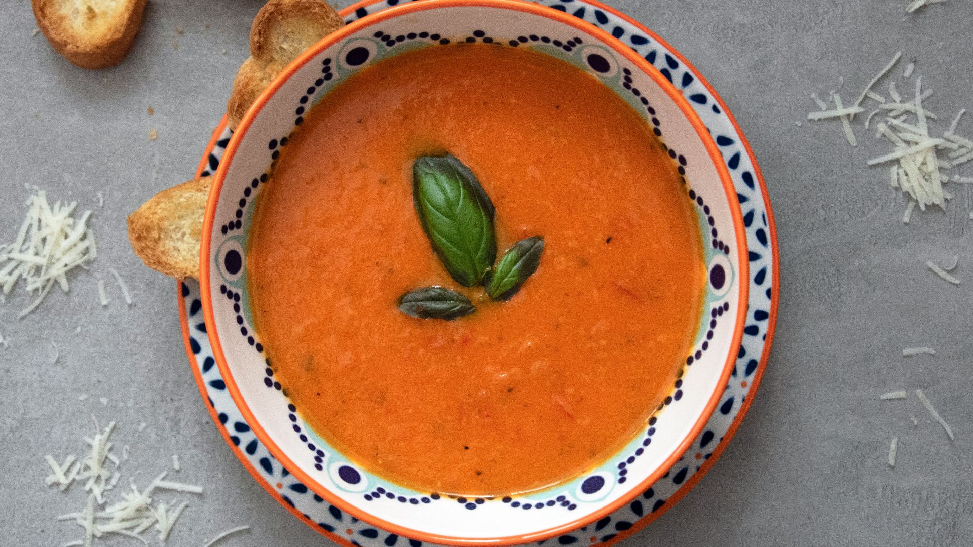 brown soup on white and blue ceramic bowl