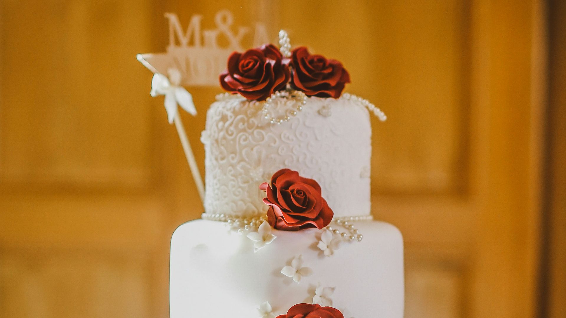 round white floral 4-tiered fondant cake
