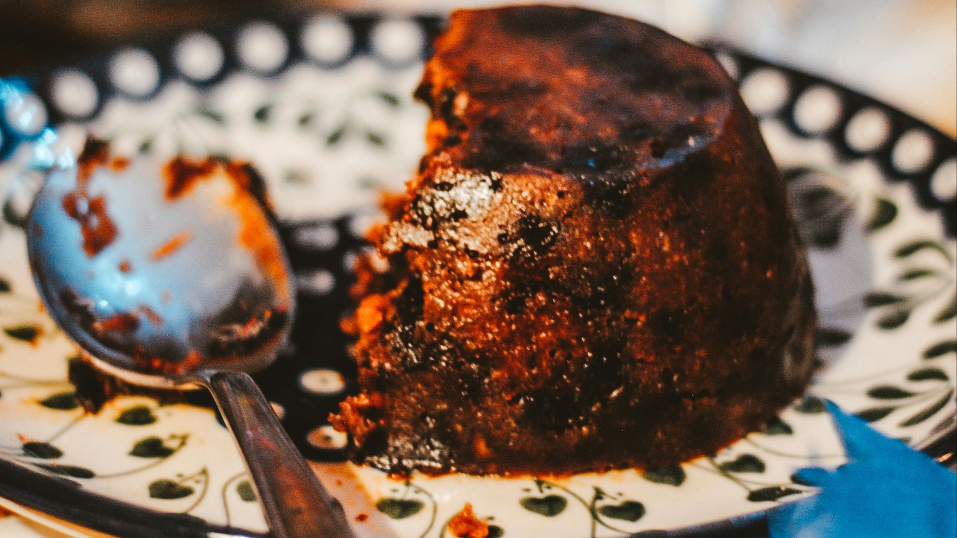 cookie on white and black ceramic saucer