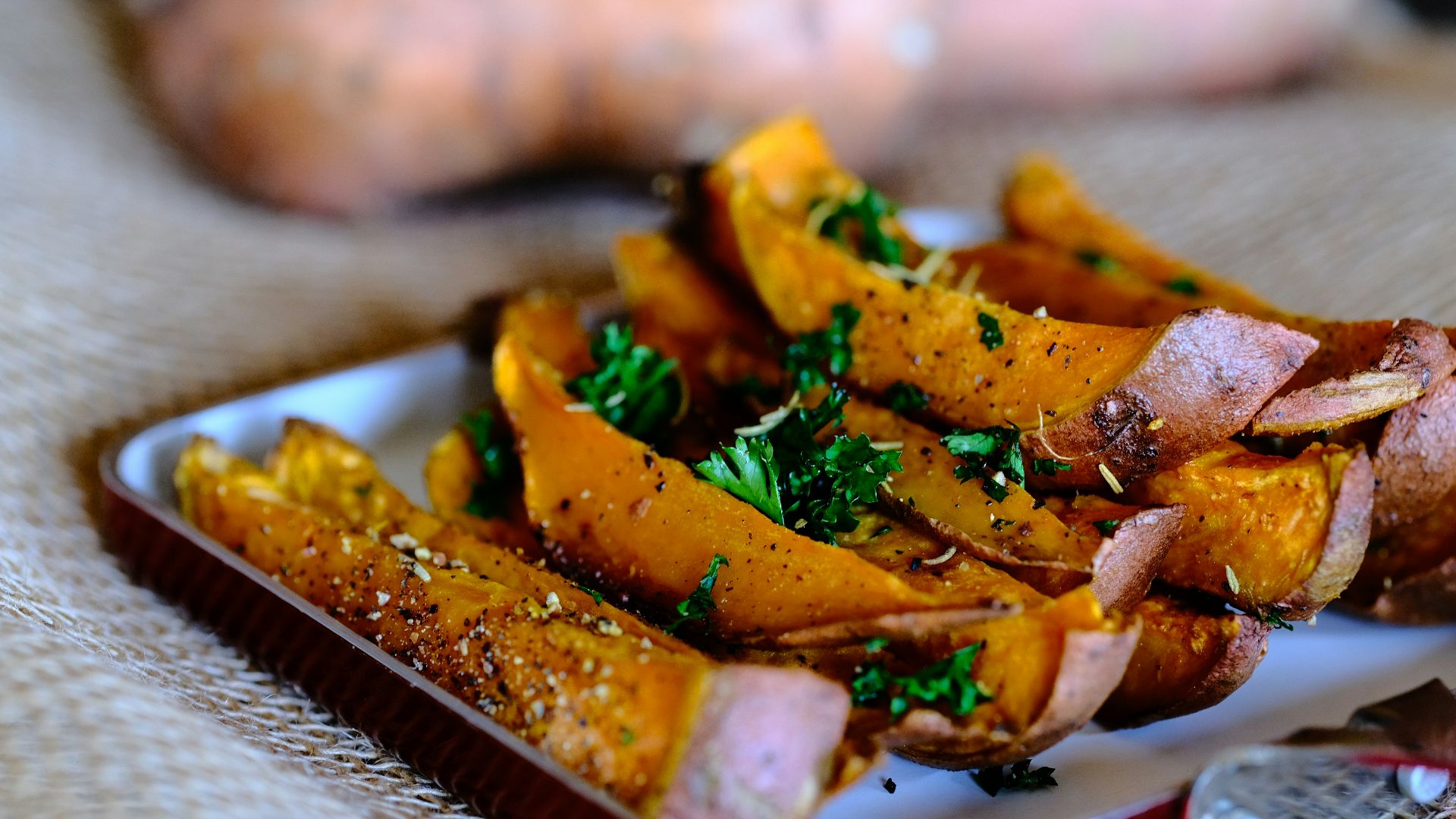 sliced vegetable on brown wooden chopping board