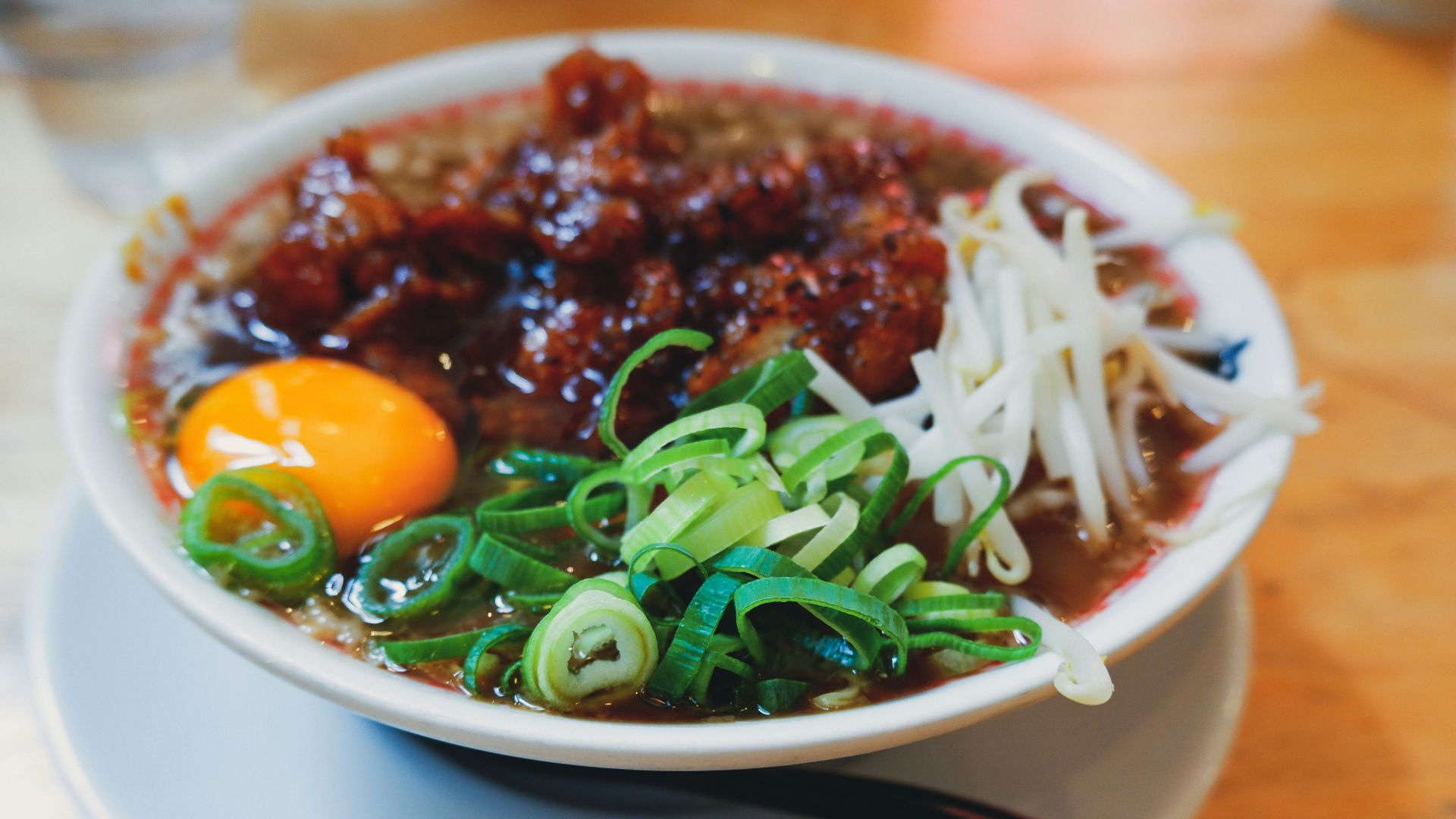 white ceramic bowl with black chopsticks