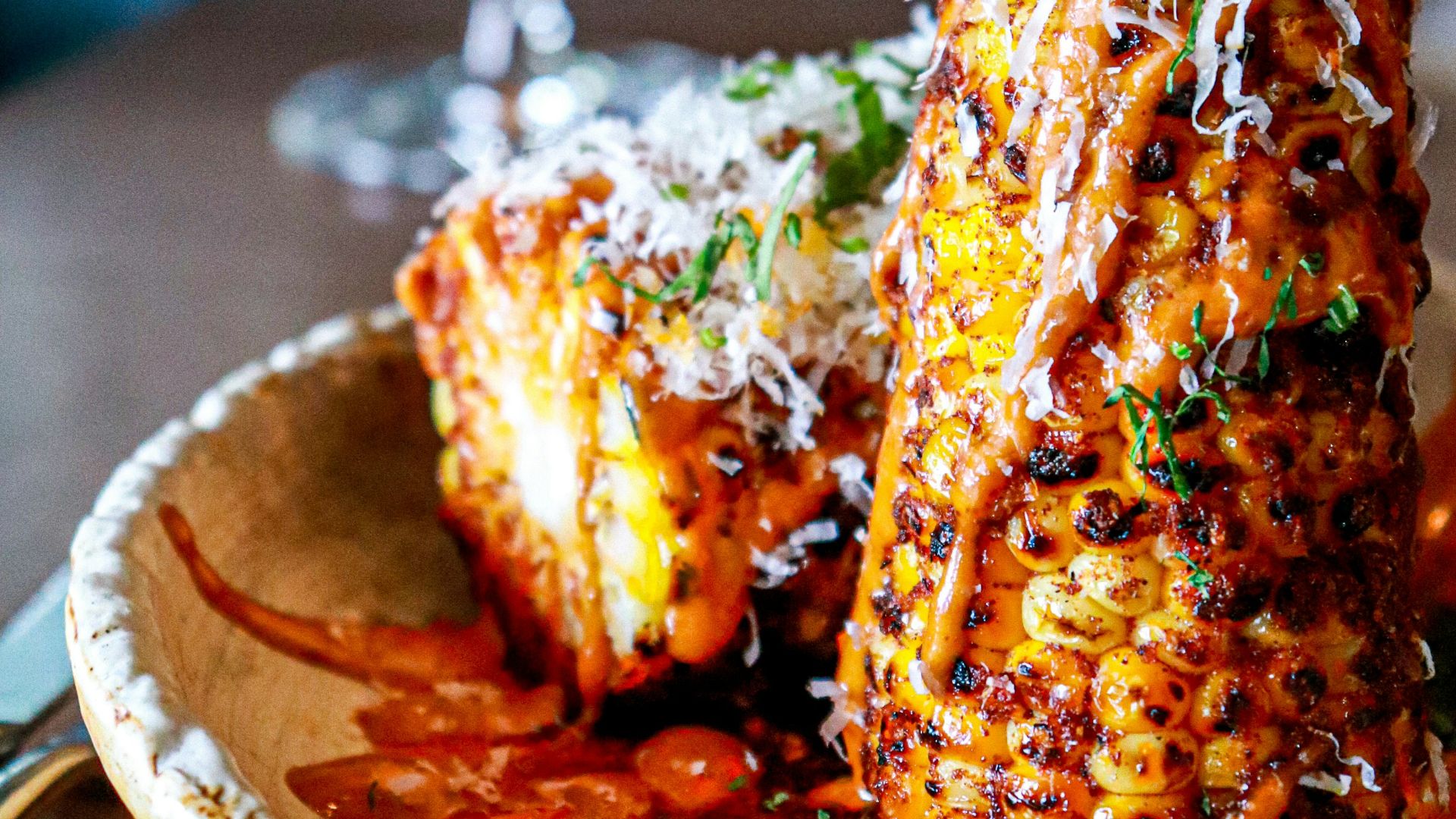 orange and white ice cream on white ceramic plate