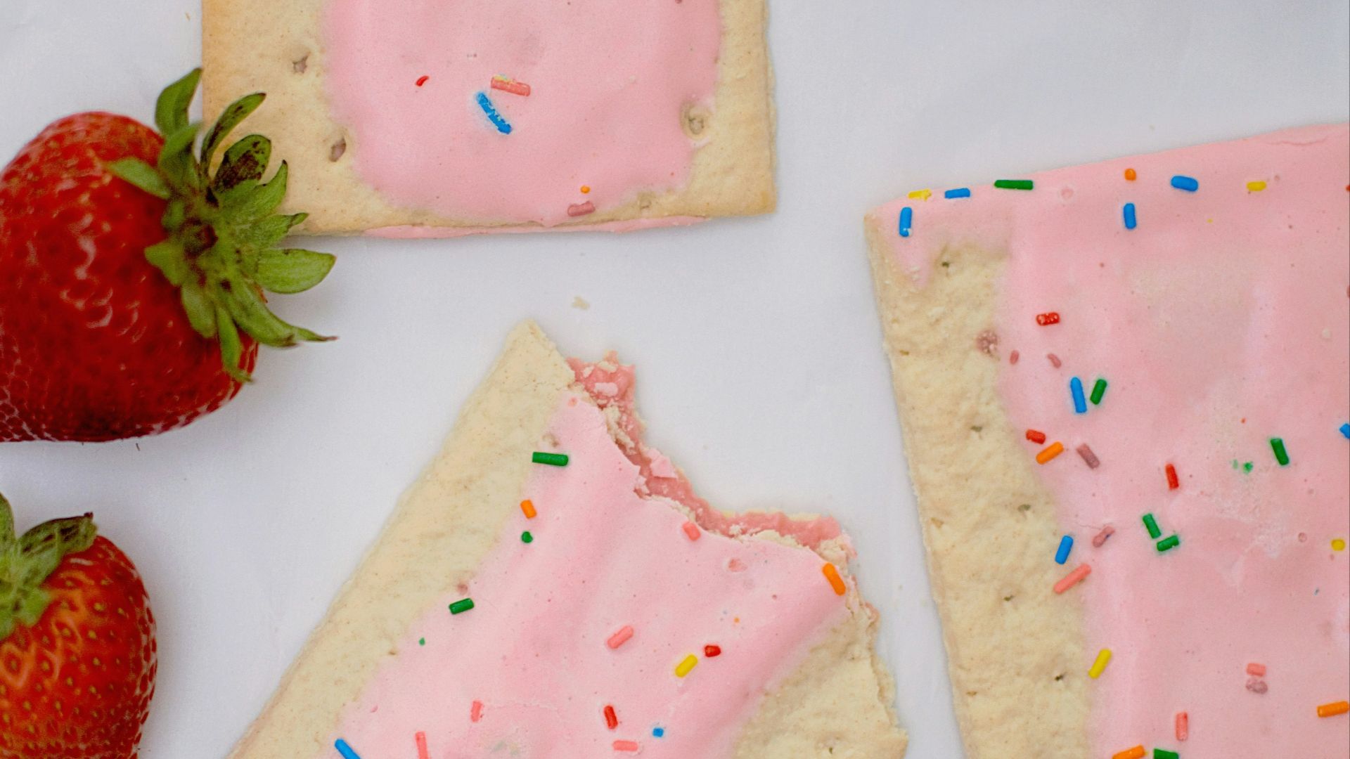 strawberries on white surface