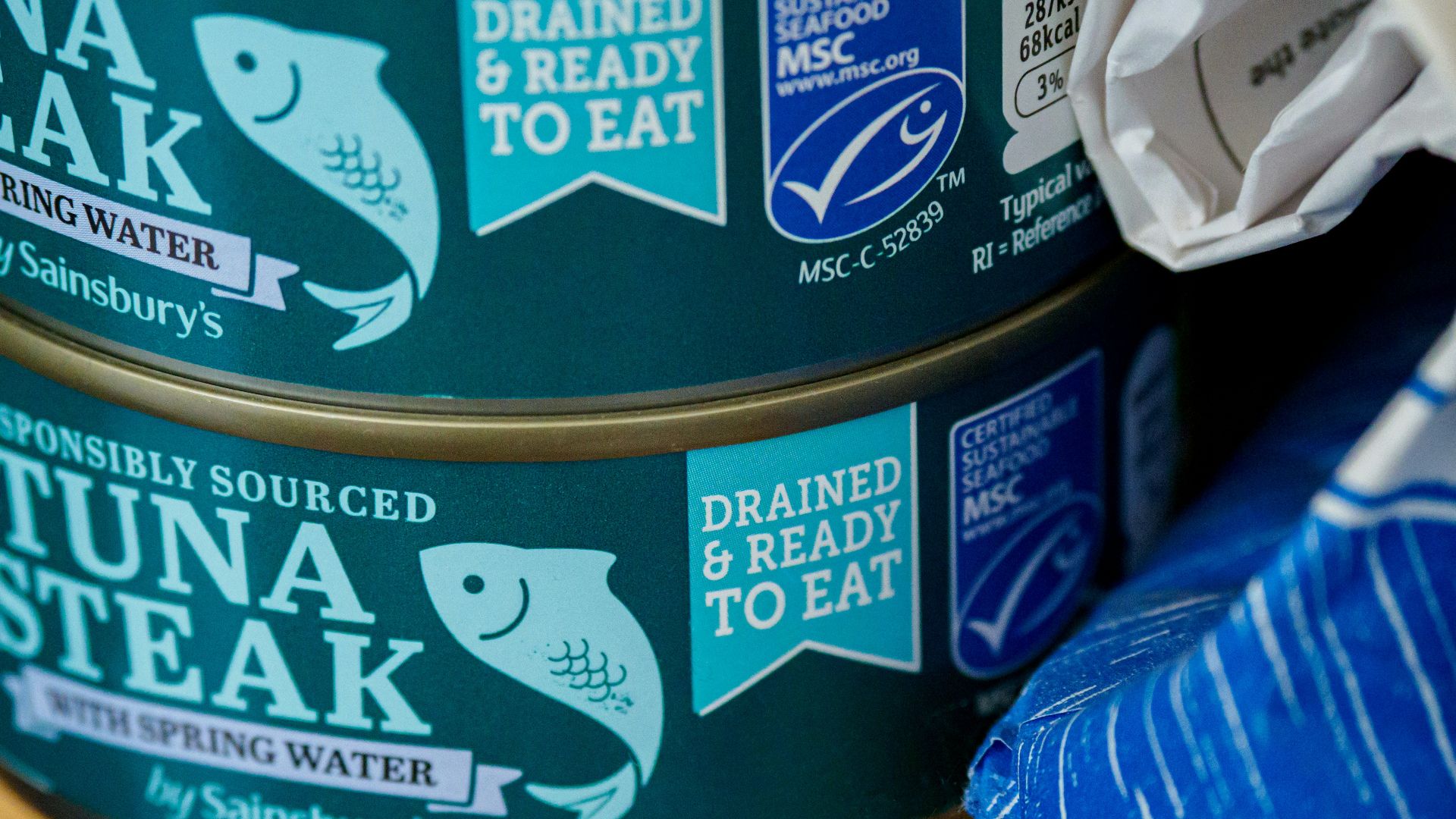 blue and white labeled can