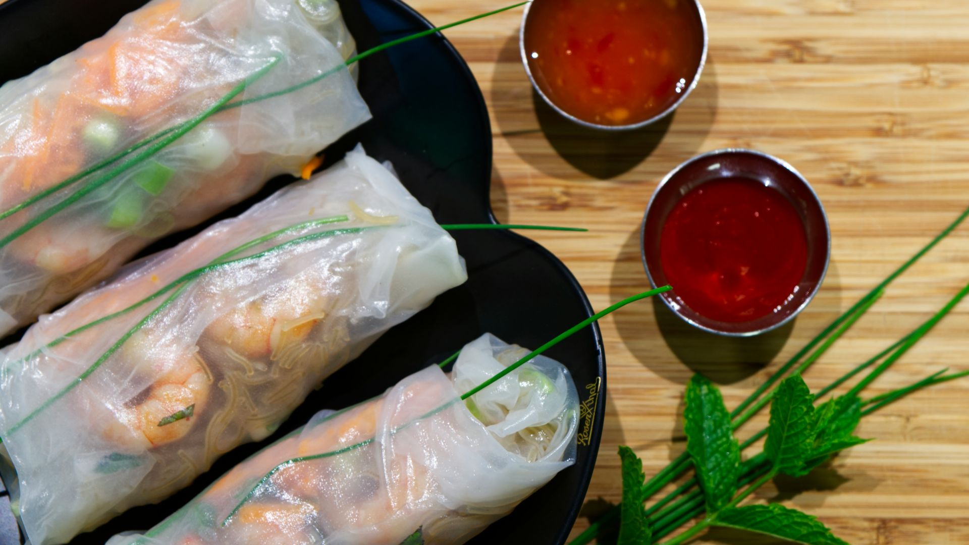 raw fish meat on black plate